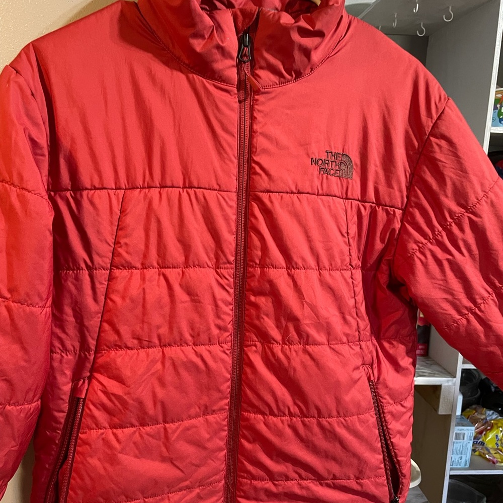 The North Face red jacket